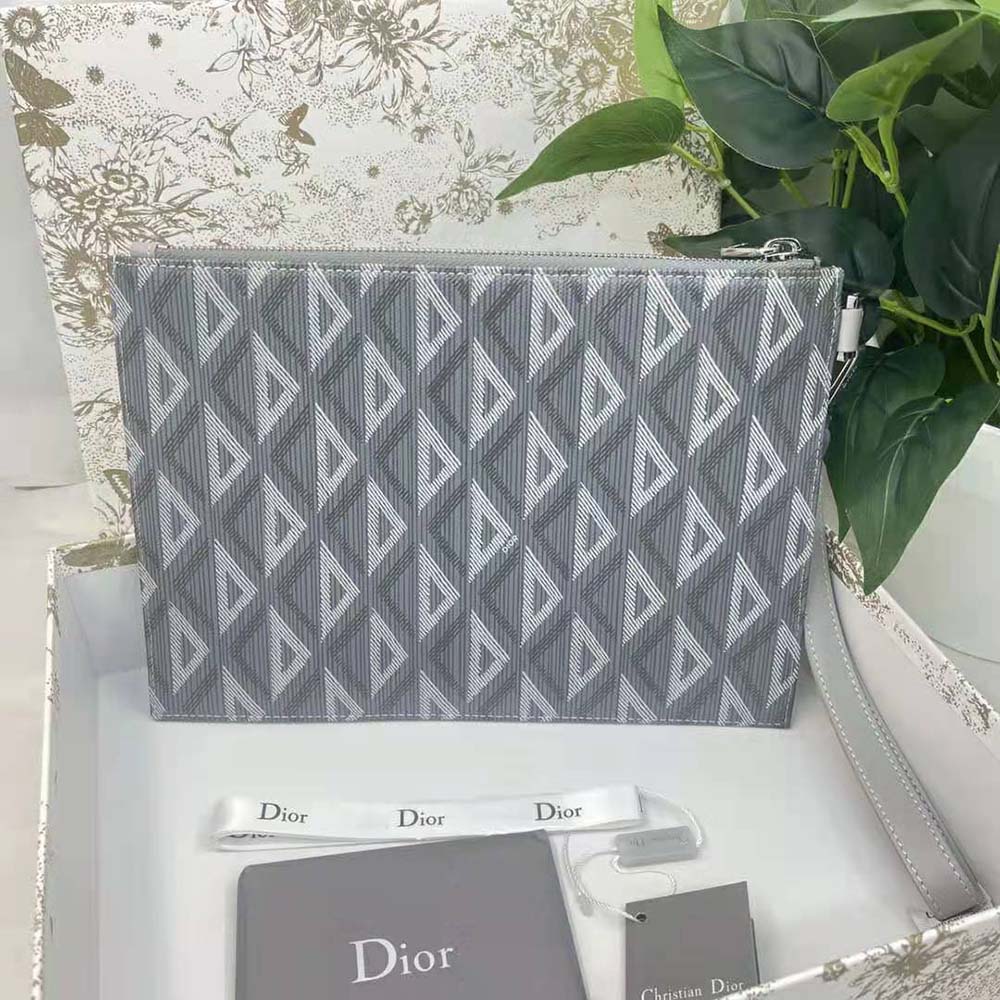 Top angle showing zip closure and canvas texture of Dior Men A5 Pouch