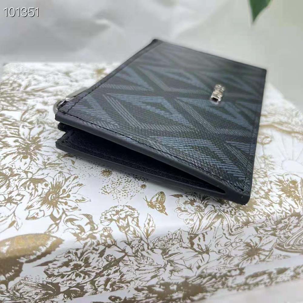 Close-up of zipper and brushed metal hardware on Dior card holder