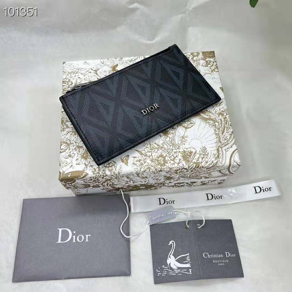 Texture detail showing Dior Oblique jacquard and grained calfskin contrast