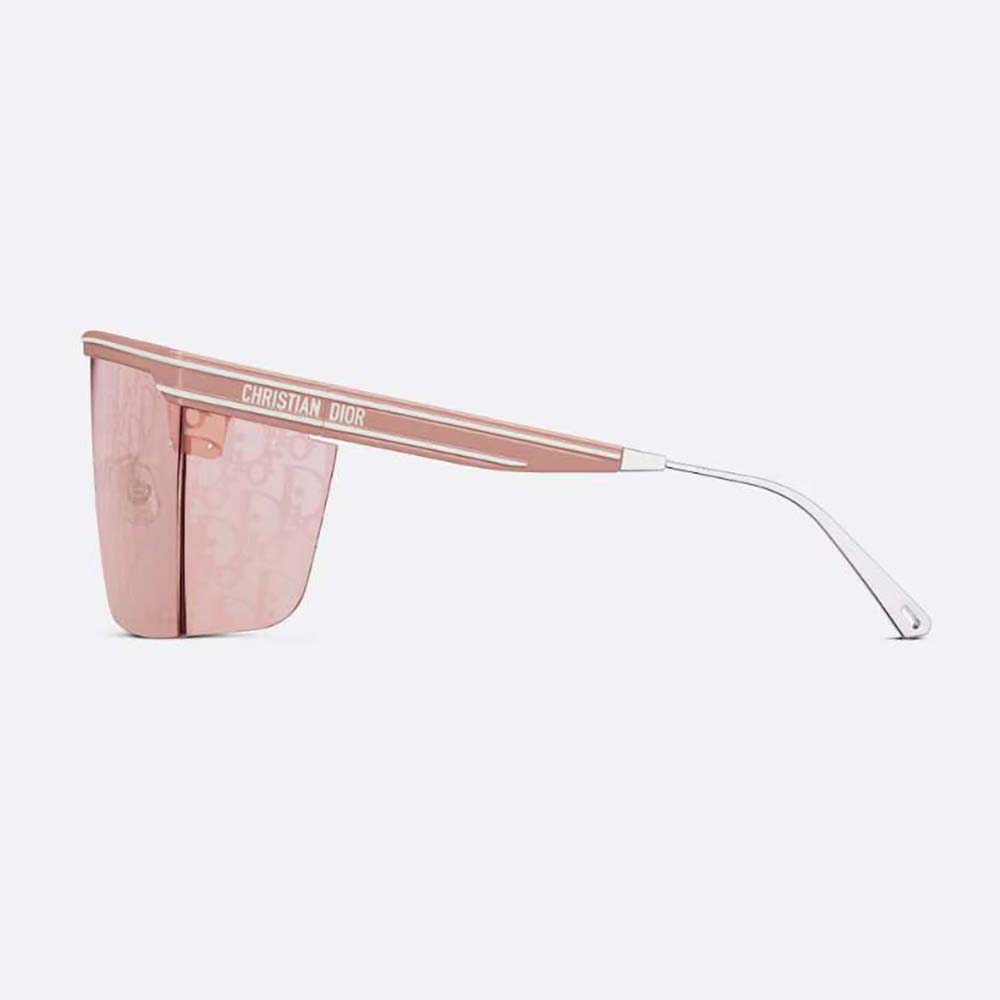 Side profile showcasing oversized pink mask silhouette in DiorClub M1U sunglasses