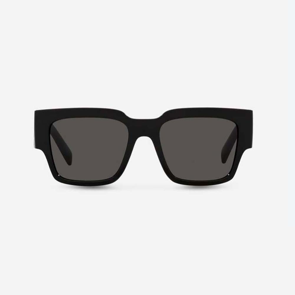 Close-up of black acetate frame and gold D&G logo detail