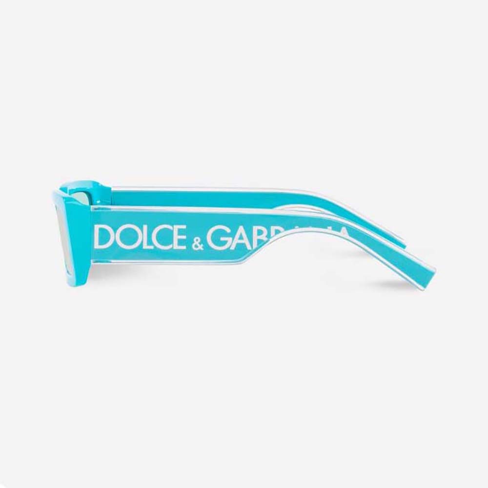 Close-up of glossy blue frame and signature D&G logo on sunglasses