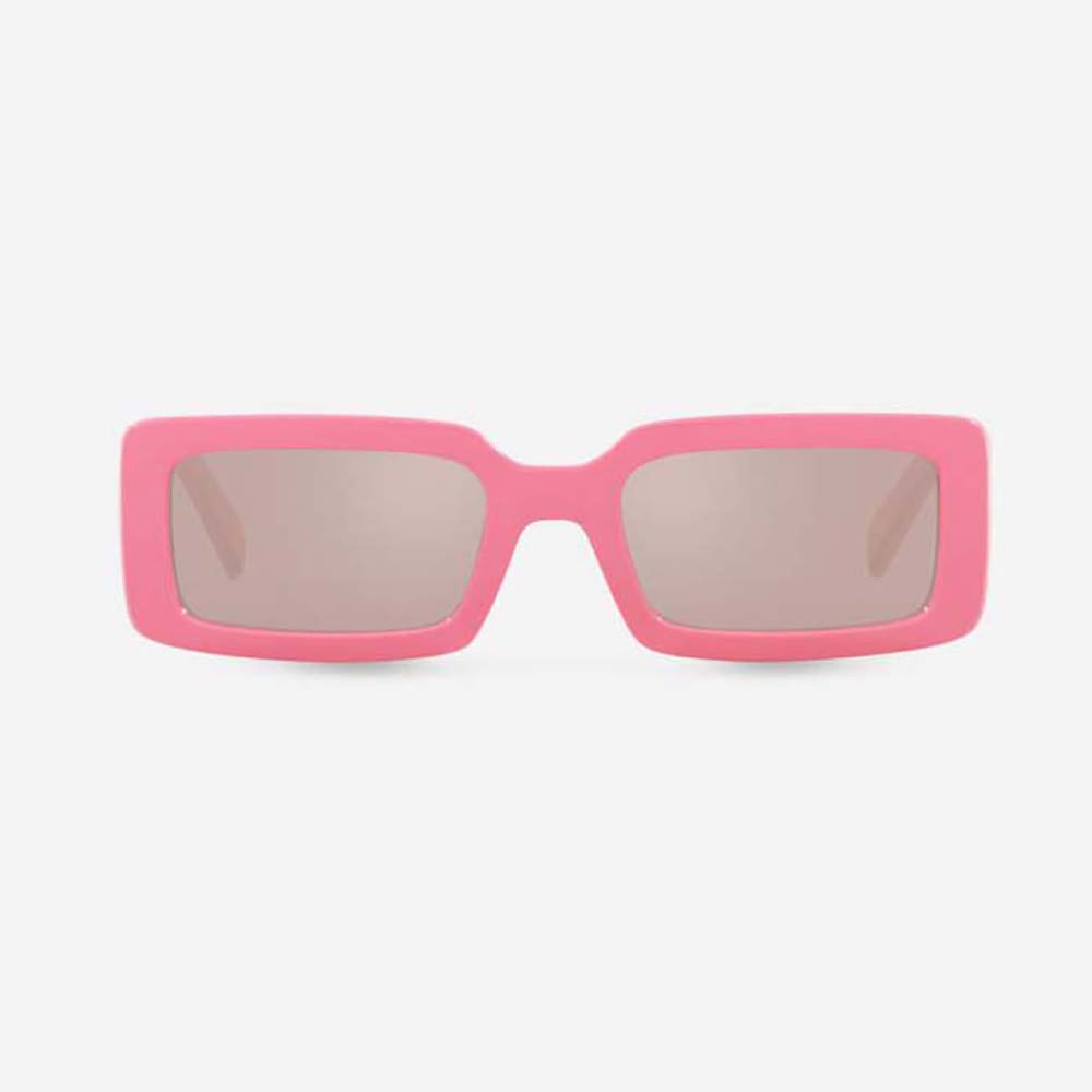 Close-up of gold D&G logo on elastic temple of pink sunglasses