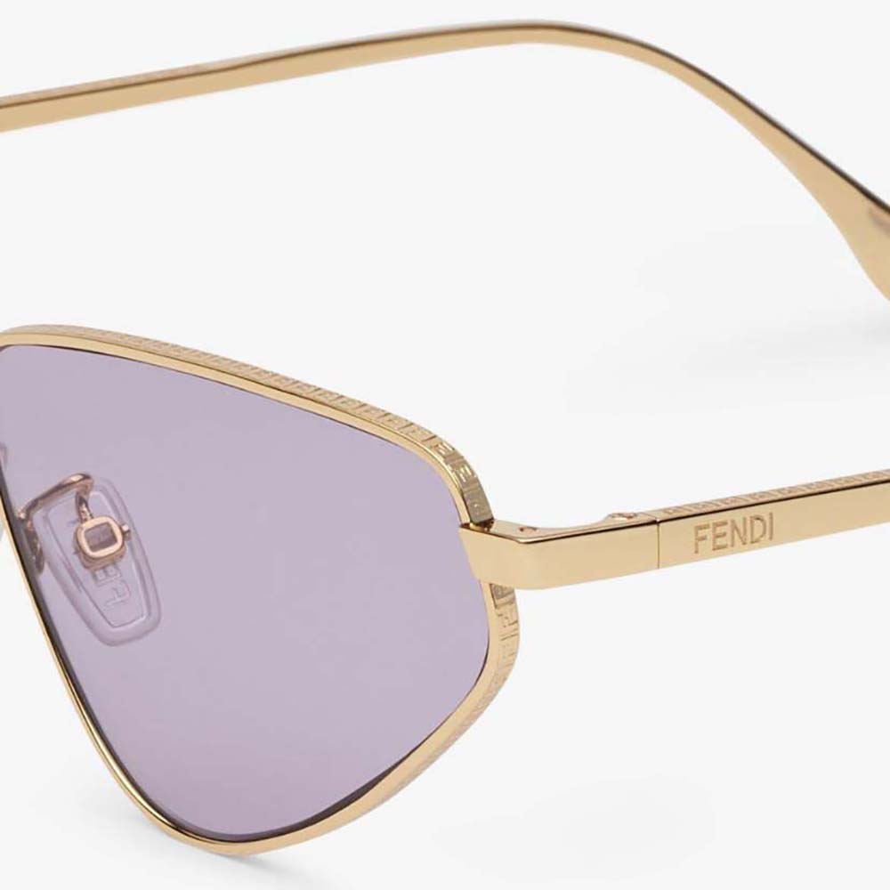 Side angle showing oversized silhouette of Fendi Women FF Sunglasses purple lenses
