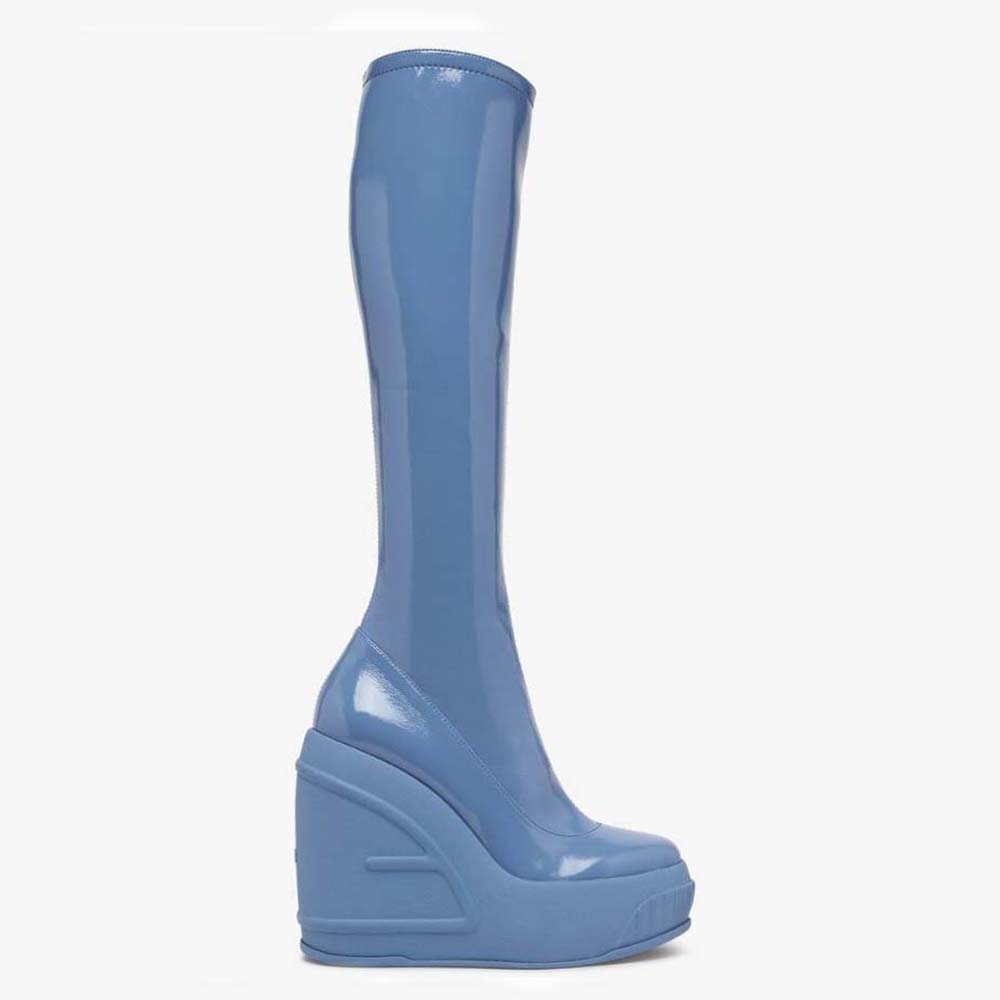 Side view of Fendi Women Fashion Show Blue Patent Leather Boots showcasing silhouette