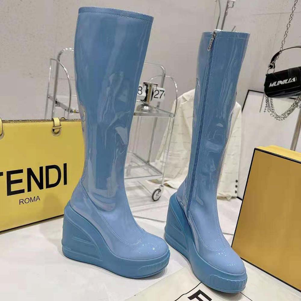Top angle of glossy blue patent leather high-heeled Fendi women’s boots