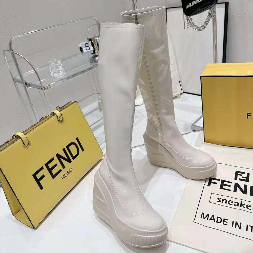 Front angle showing lace-up detail on Fendi fashion boots