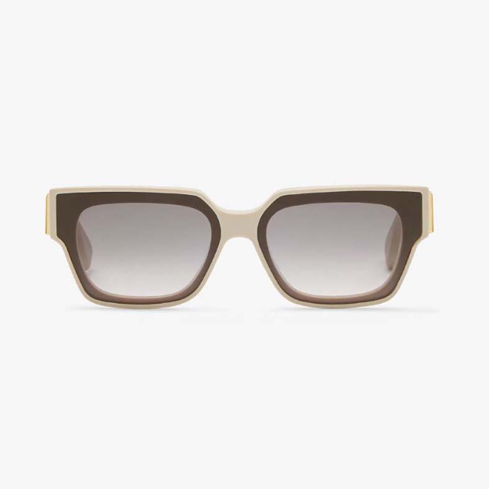 Close-up of gold hardware detail on Fendi Women Fendi First Cream Acetate Sunglasses temple