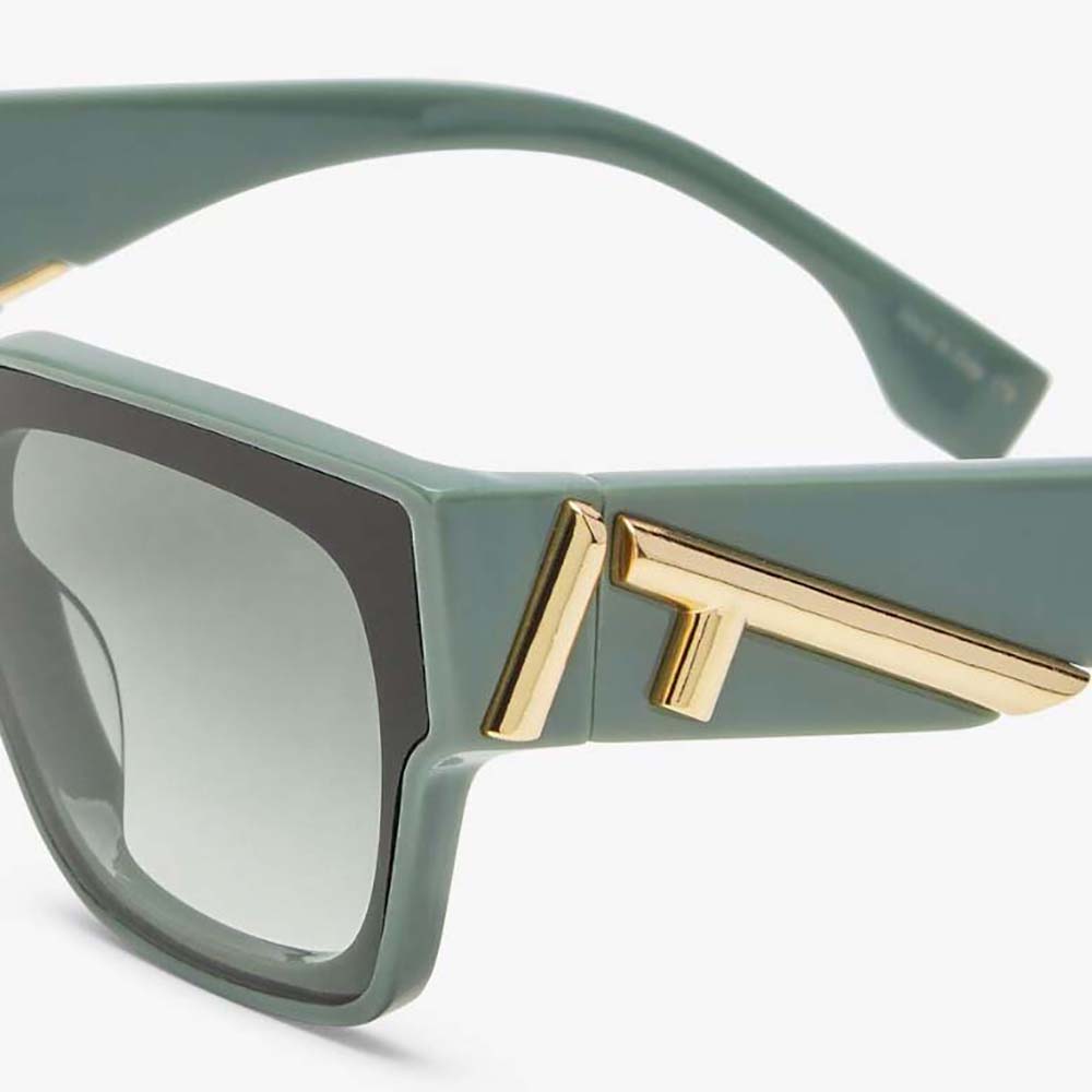 Side profile showing silhouette and hinge details of Fendi Women Fendi First Dark Green Acetate Sunglasses