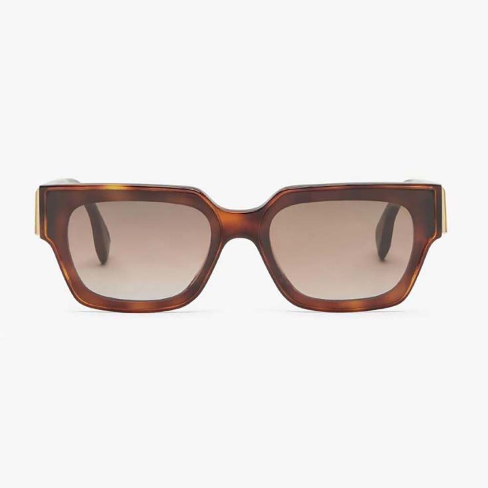 Close-up on gold hardware detail of Fendi Women Fendi First Havana sunglasses