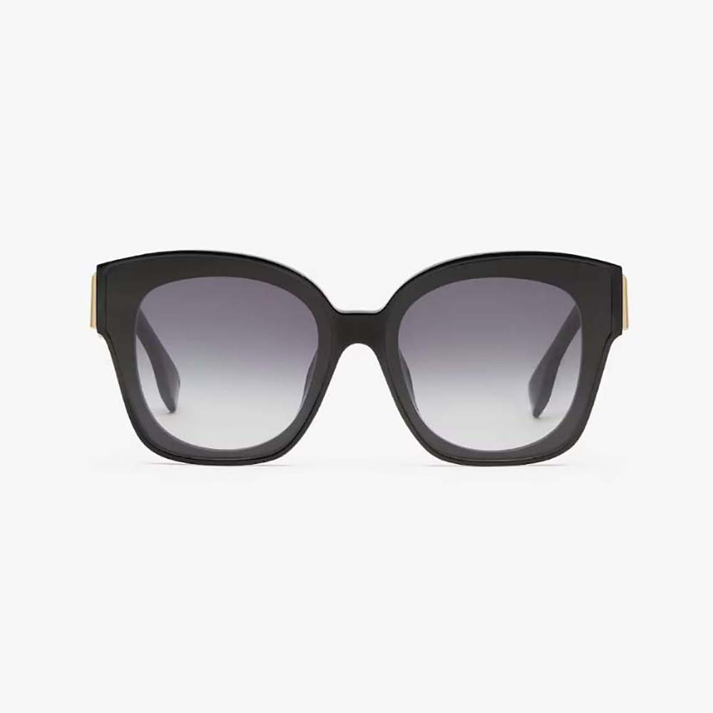 Close-up of gold Fendi logo on temple of Fendi Women Square Fendi First Black Acetate Sunglasses