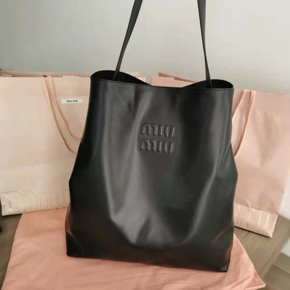 Close-up of embossed lettering logo on Miu Miu Women Leather Shoulder Bag