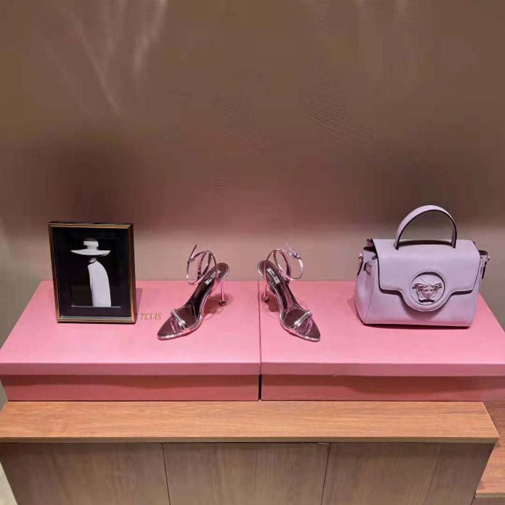 Close-up of adjustable buckle on Miu Miu Women Metallic Leather Sandals-Pink