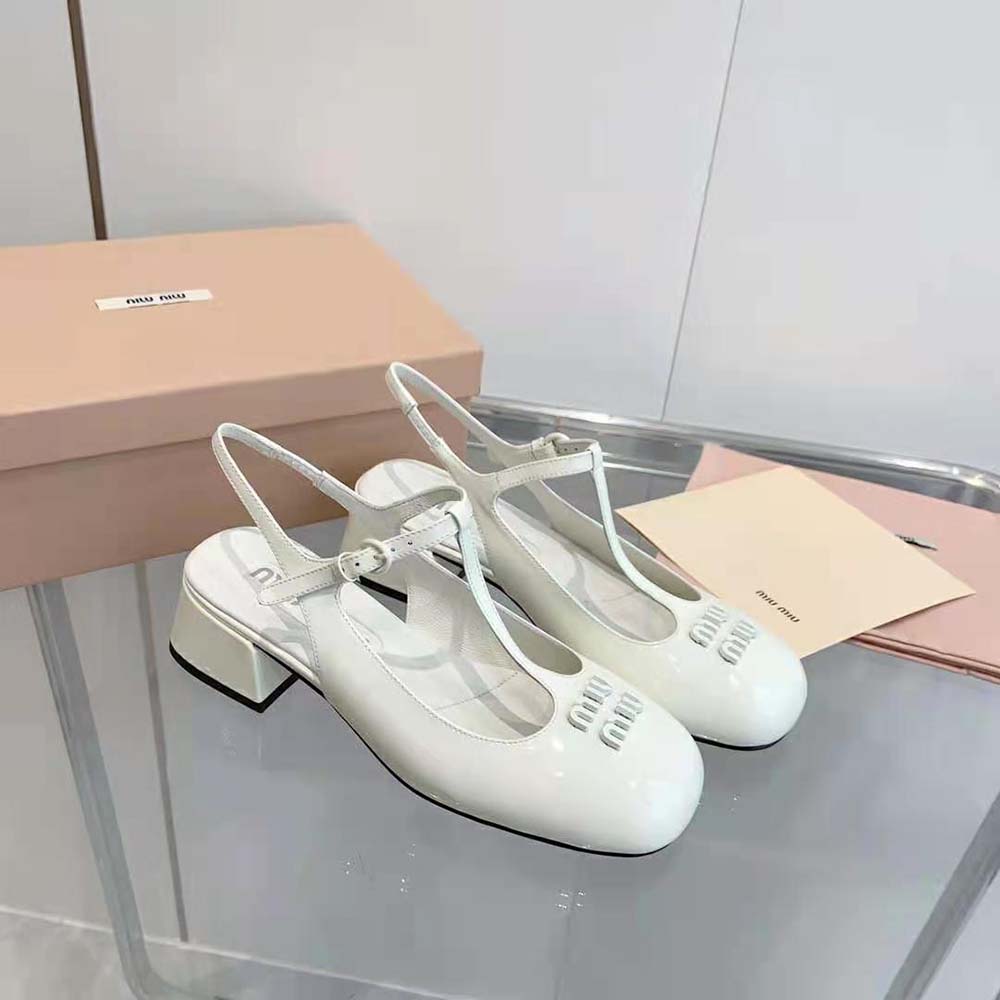 Side profile showing signature hardware on Miu Miu slingback pumps