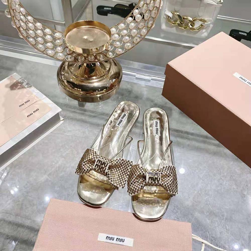 Close-up detail of crystal embellishments on Miu Miu Women Vinyl and Metallic Leather Sandals