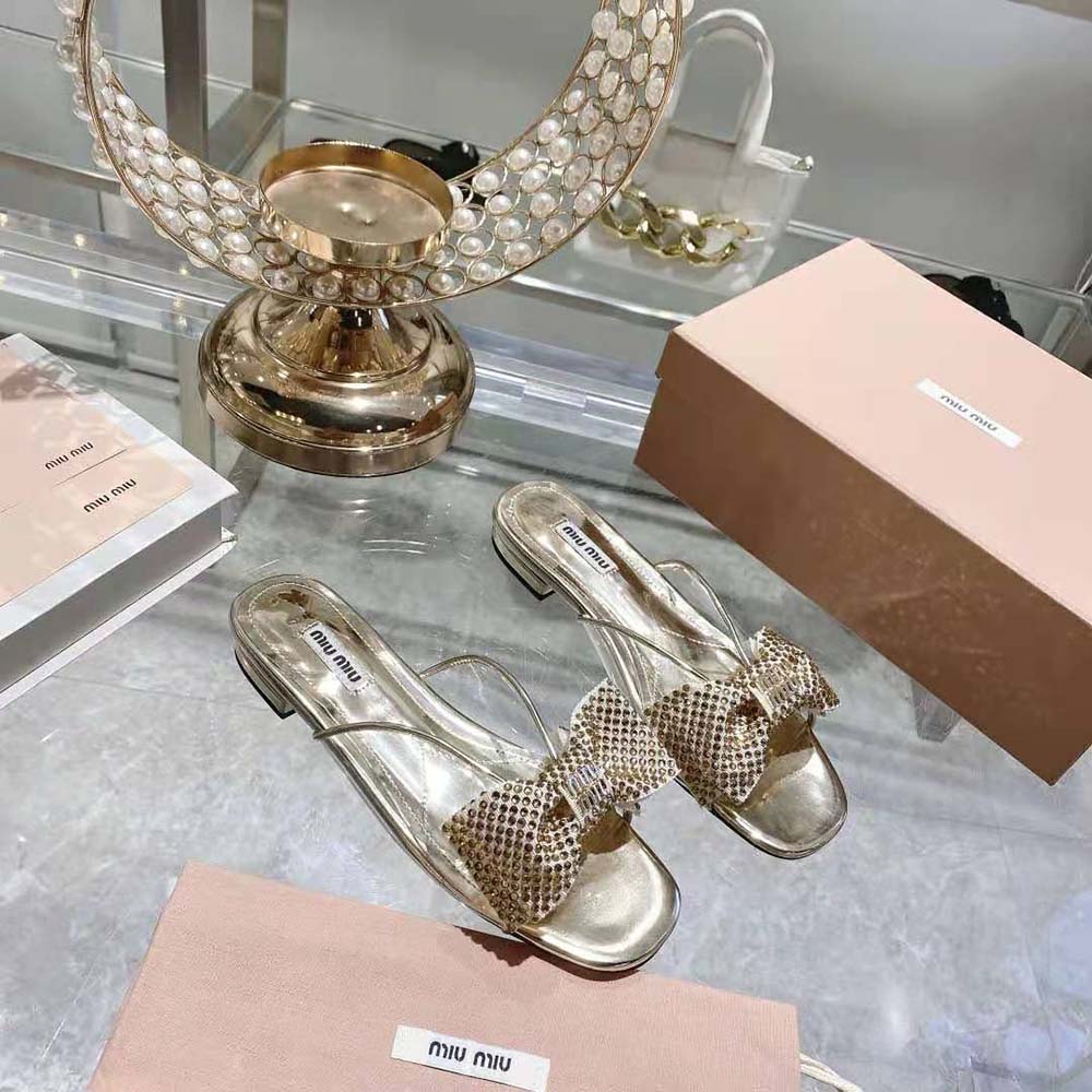 Side view showing buckle closure on Miu Miu Women Vinyl and Metallic Leather Sandals with Crystals