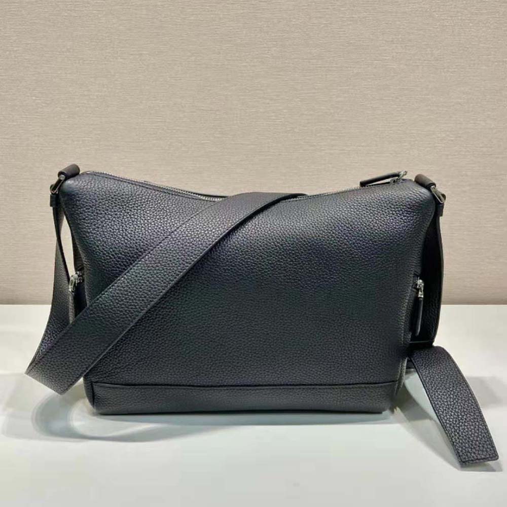 Side angle showing adjustable shoulder strap of Prada Men Leather Bag