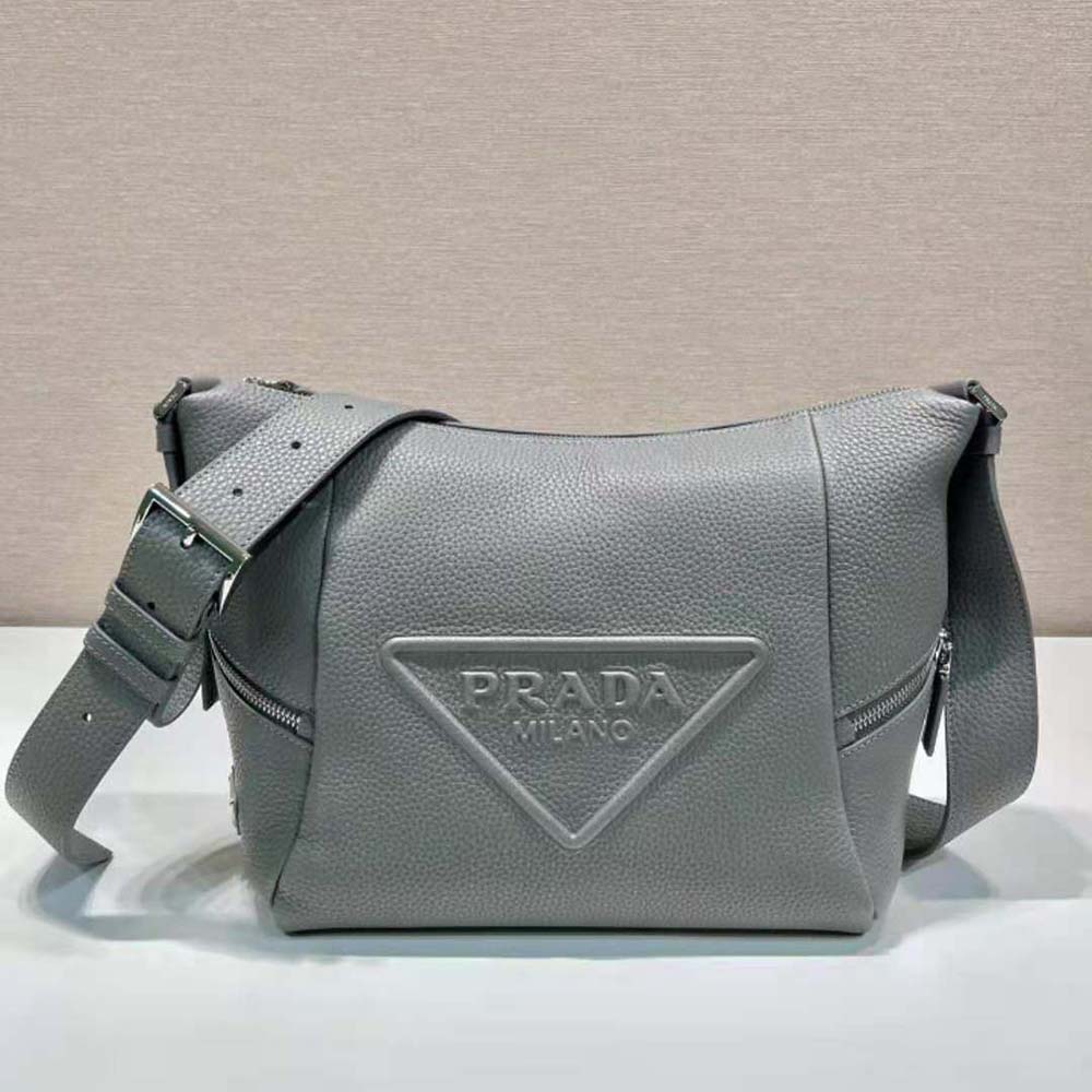 Close-up of smooth gray calf leather and silver-tone hardware on Prada bag