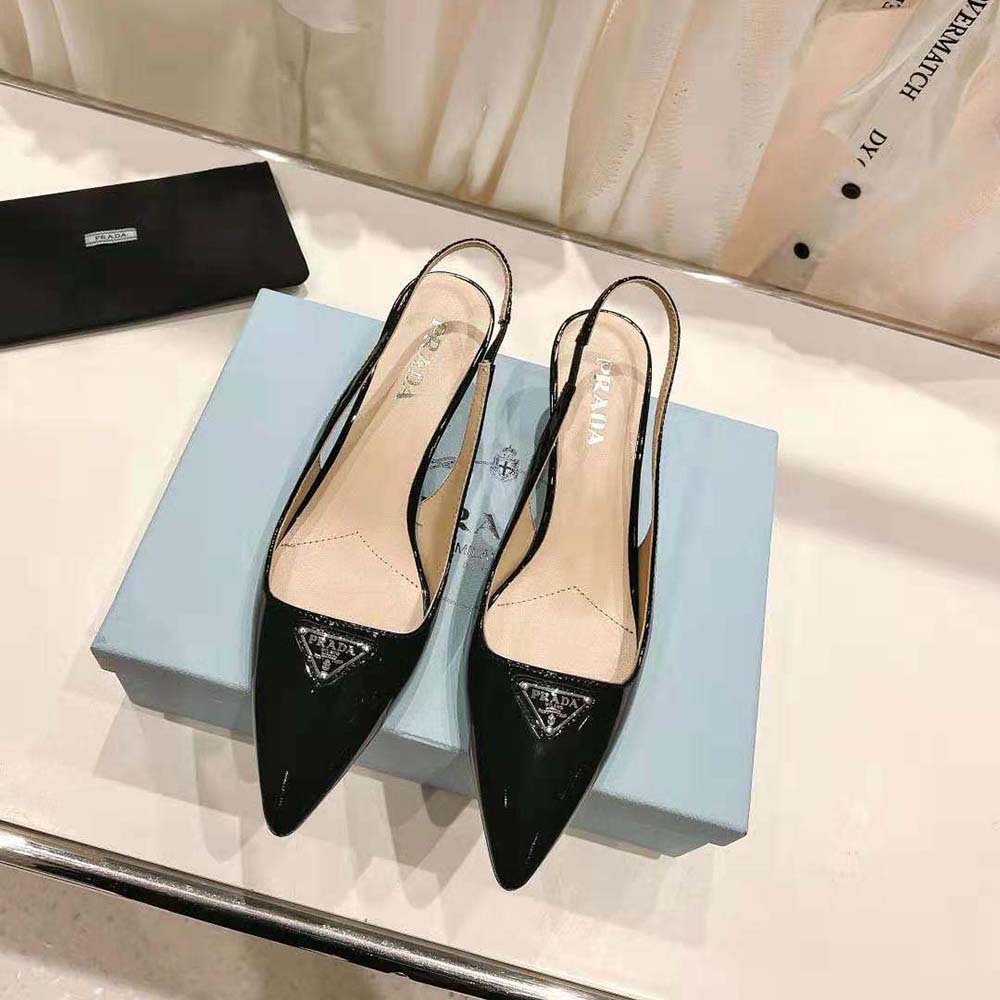 Close-up of slingback buckle on Prada Women Patent-Leather Slingback Pumps-Black