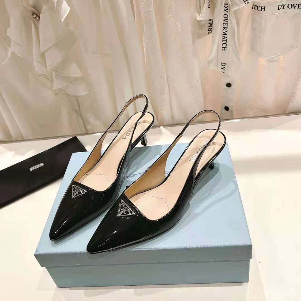 Side profile showcasing heel height of Prada Women Patent-Leather Slingback Pumps-Black