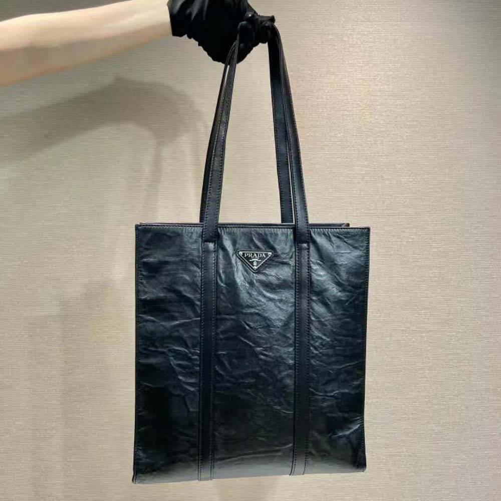 Close-up of silver-tone hardware on Prada Women Small Antique Nappa Leather Tote-Black