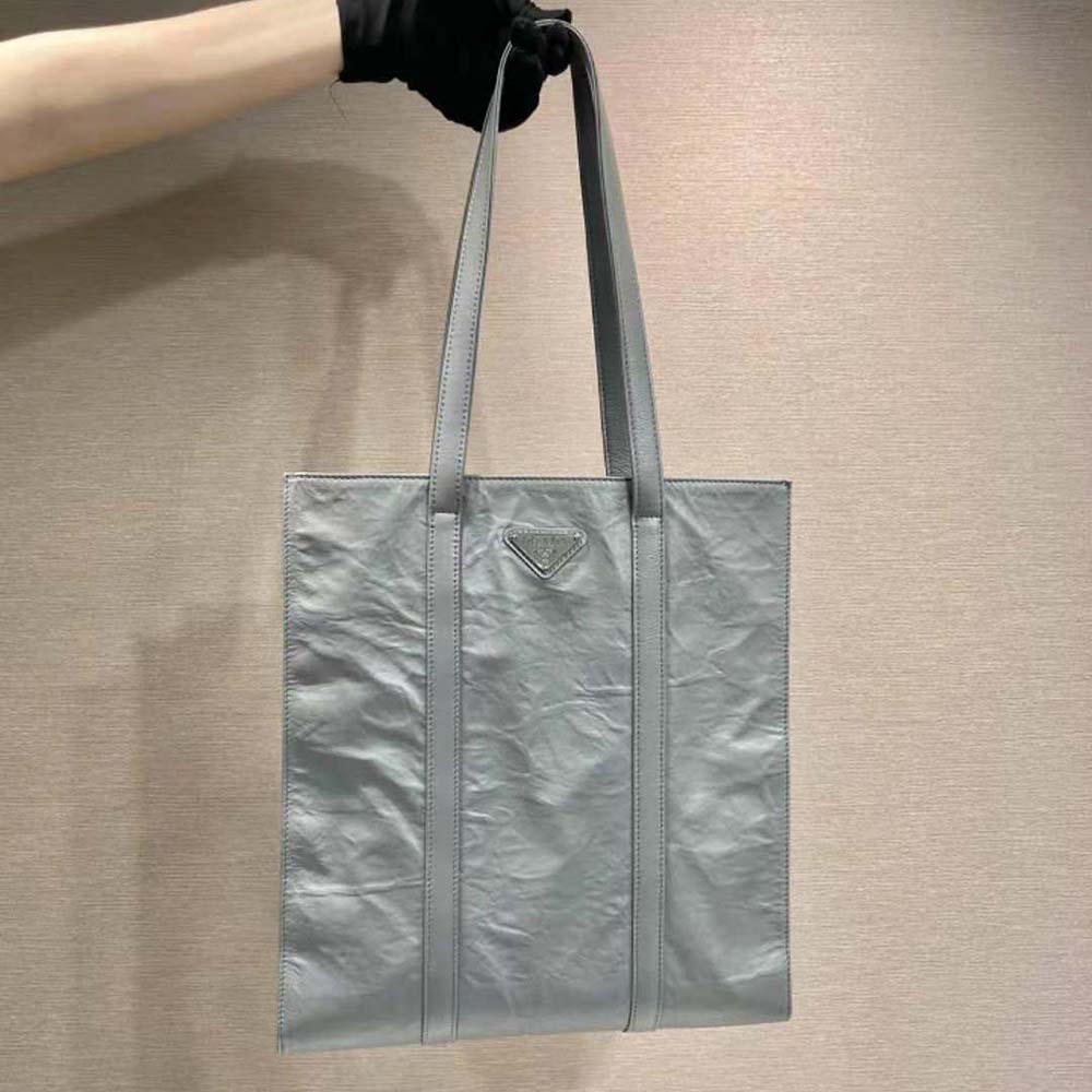 Close-up of gray antique Nappa leather texture on Prada tote