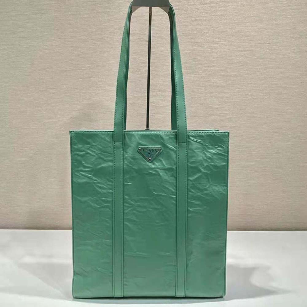 Side angle showcasing the tote’s supple leather texture and shape