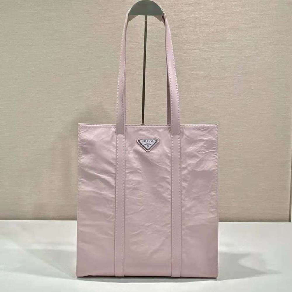 Side profile showing structured silhouette of Prada Women Small Antique Nappa Leather Tote-Pink