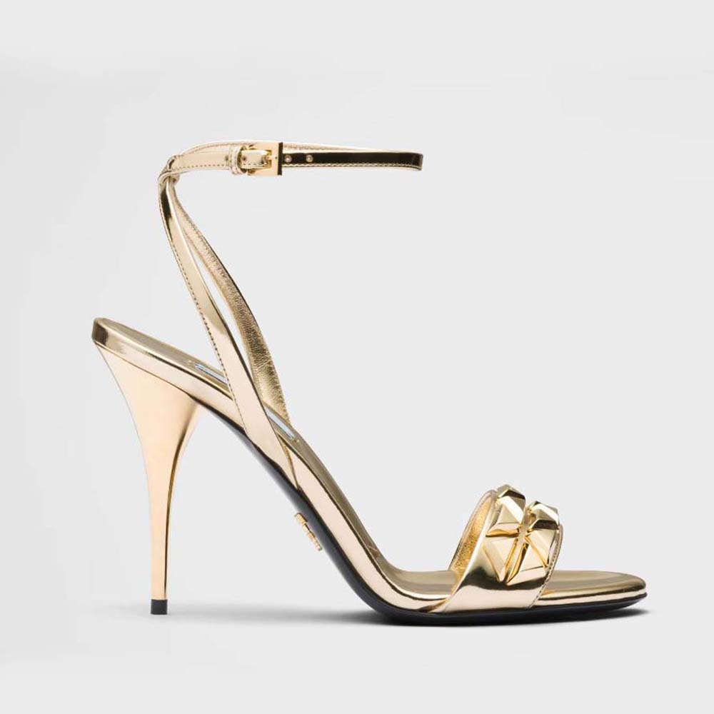 Side view of Prada Women Studded Metallic Leather High-Heeled Sandals in gold