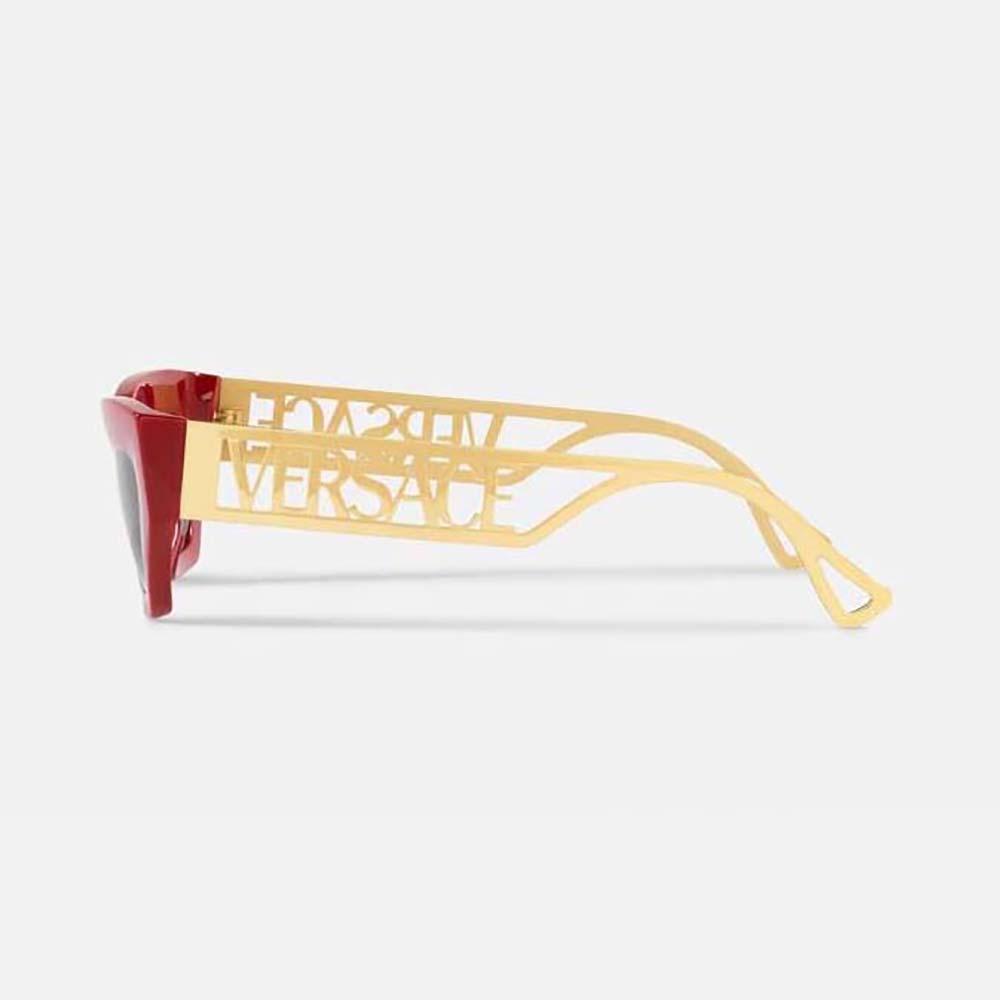 Side angle showing red acetate frame and temple on Versace cat-eye sunglasses