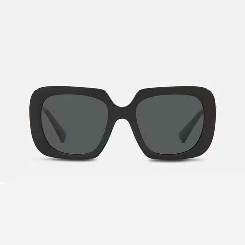 Close-up of double Medusa logo detail on black sunglasses