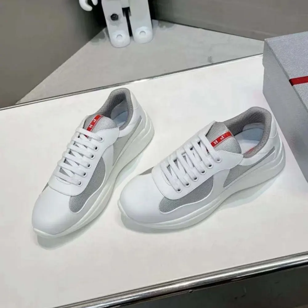 Close-up of white bike fabric and rubber texture on Prada sneakers