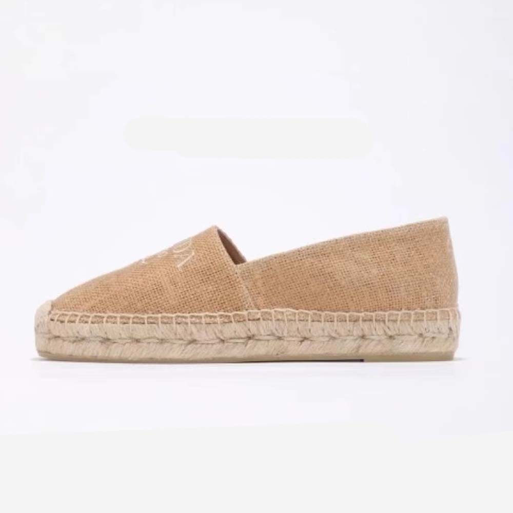 Top angle showing crochet texture and slip-on design of Prada espadrilles
