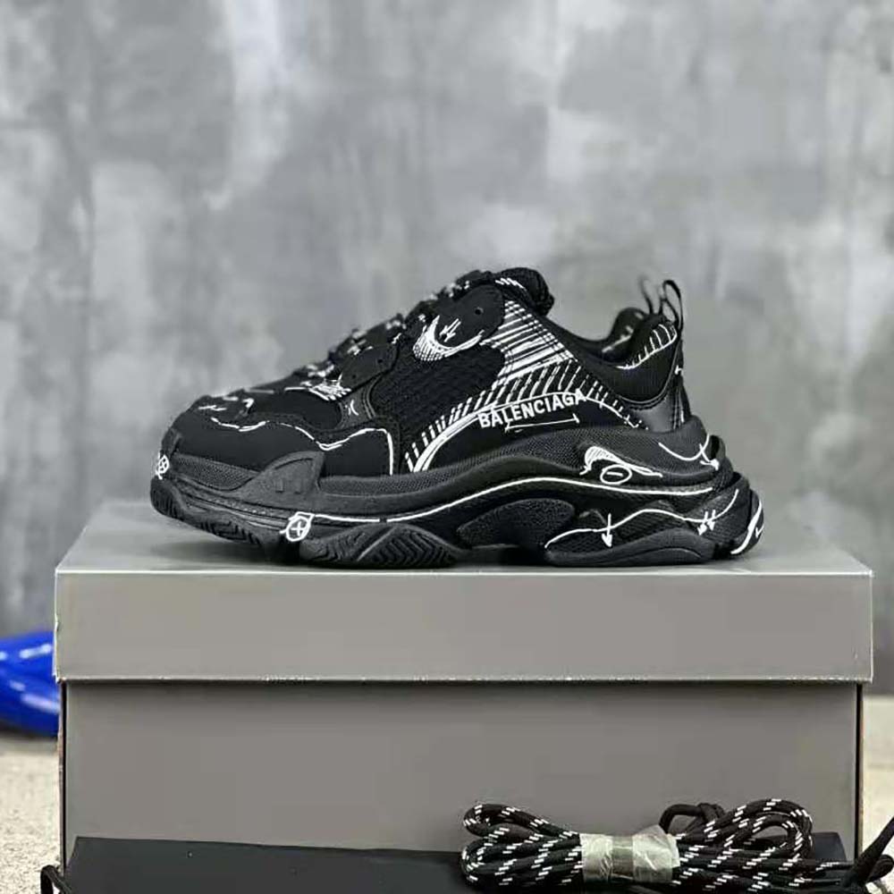 Close-up on mesh upper and double foam sole of Balenciaga Triple S Sketch Sneaker