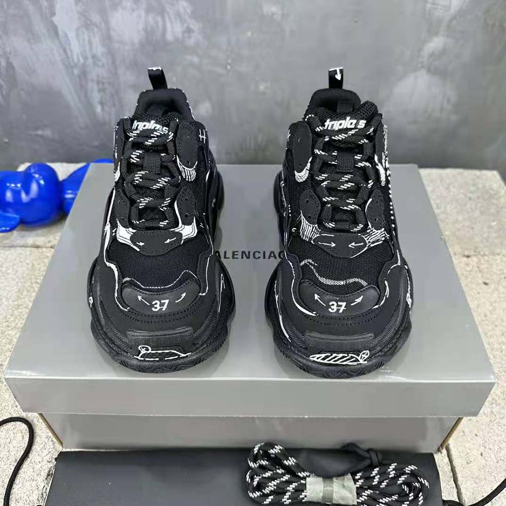 Top view showing laces and sculpted silhouette of Balenciaga Unisex Triple S Sketch Sneaker