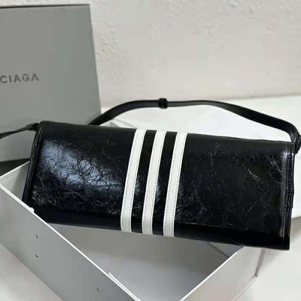 Side angle showing adjustable strap on Balenciaga Women Wallet