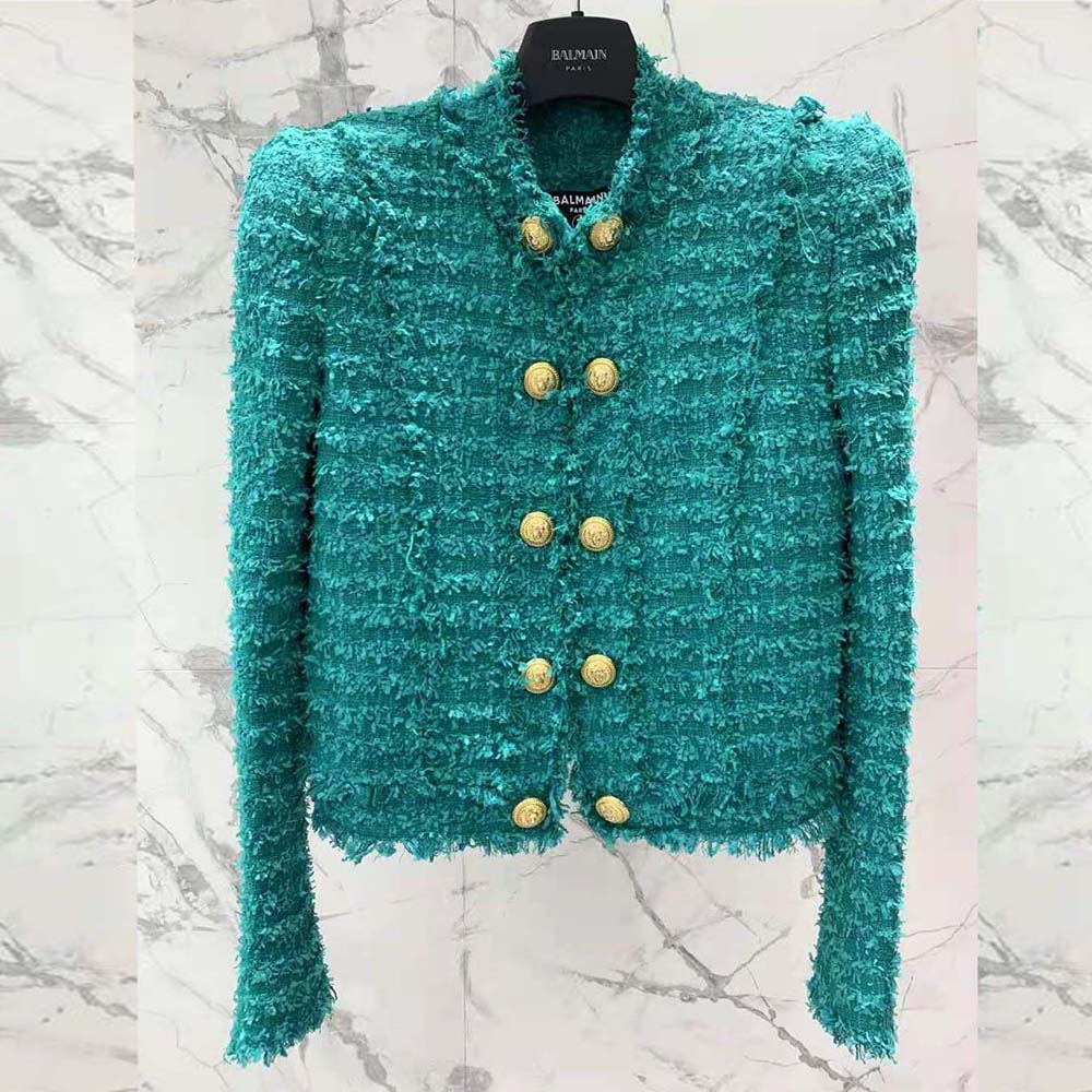 Side profile highlighting tailored fit of Balmain Women Fringed Tweed Jacket-Green