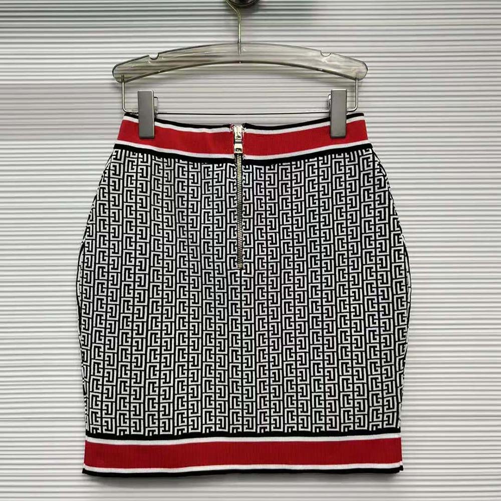 Side angle showing fit and silhouette of Balmain Women Knit Skirt with Buttons