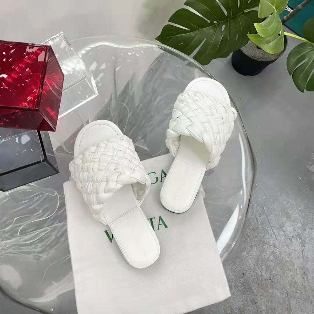 Top view showcasing the white leather and flat sole of the Bottega Veneta sandals