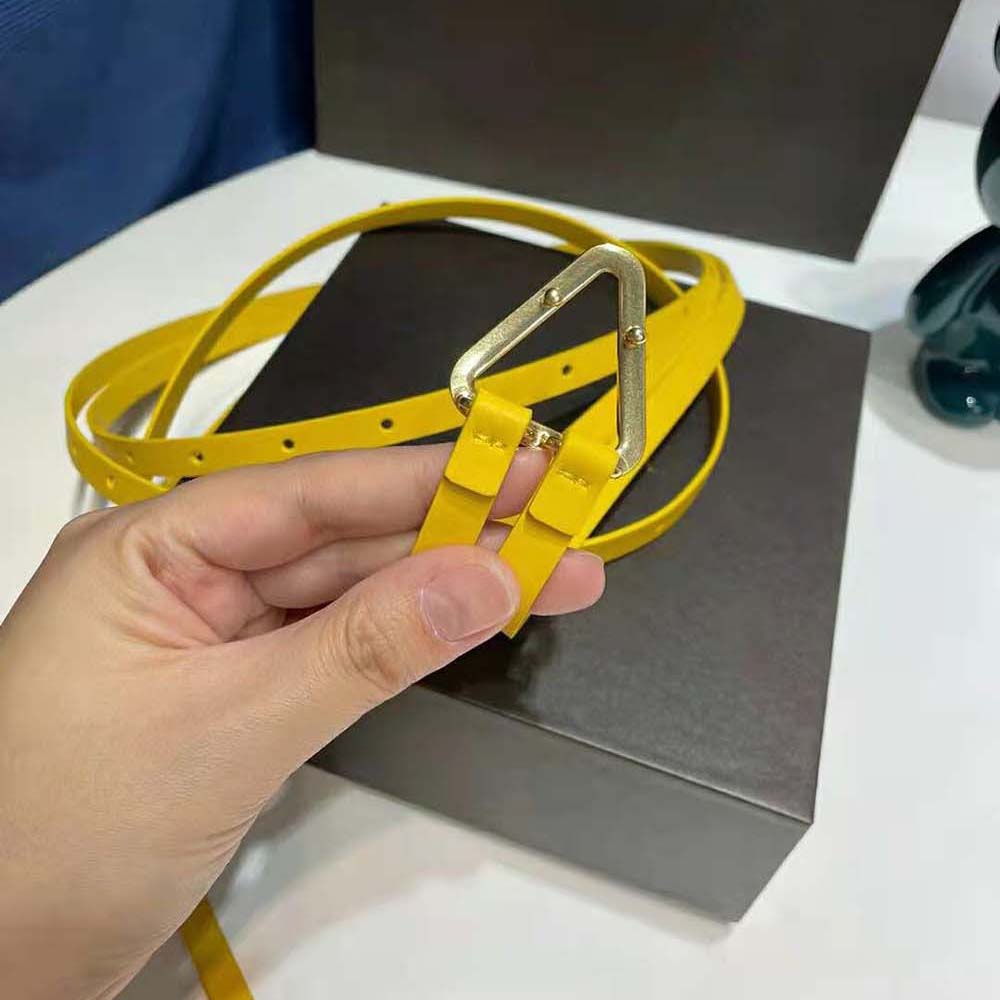 Side angle showcasing textured yellow leather of Bottega Veneta Women Grasp Belt