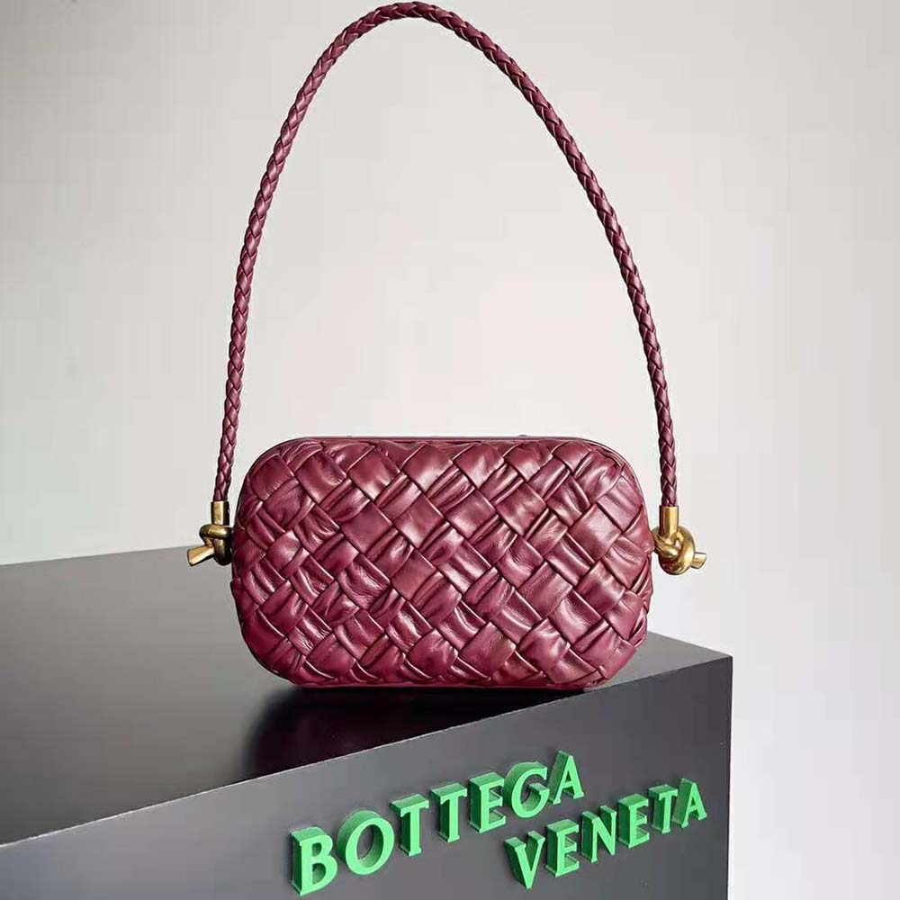 Close-up of maroon intrecciato leather and knot detail Minaudiere
