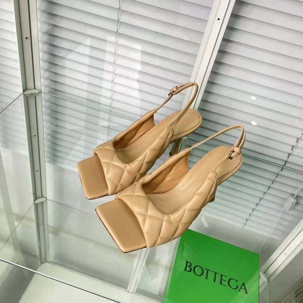 Back angle showing adjustable slingback and heel of Bottega Veneta sandal