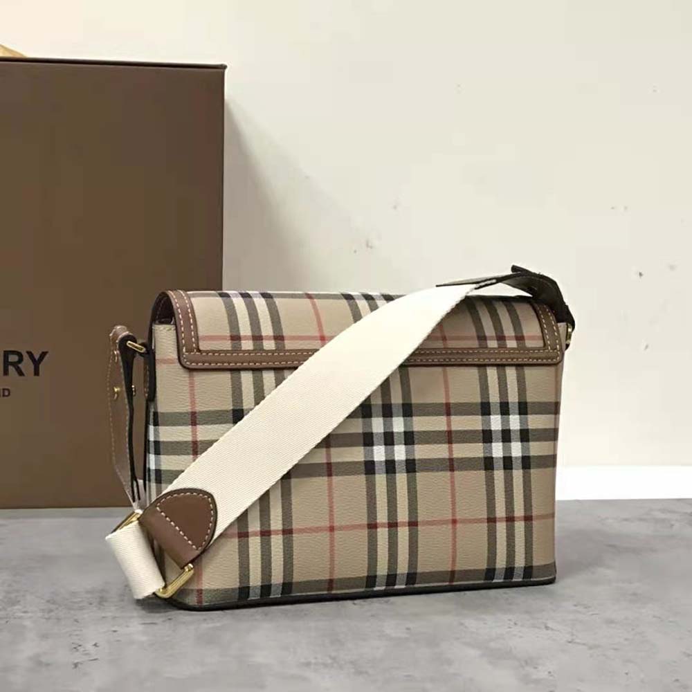 Side profile showing adjustable shoulder strap of Burberry Women Note Bag