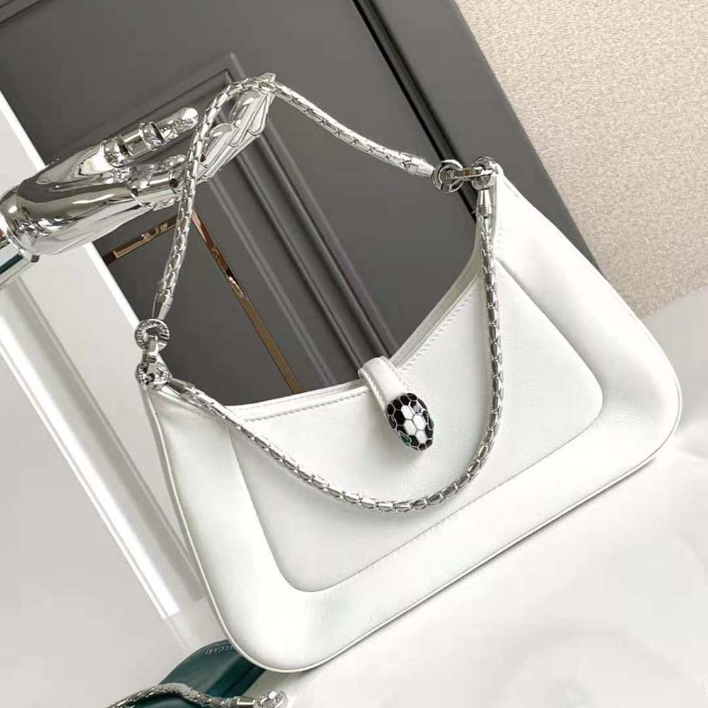 Close-up of gold serpent-head closure on Bvlgari Serpenti Baia Small Shoulder Bag
