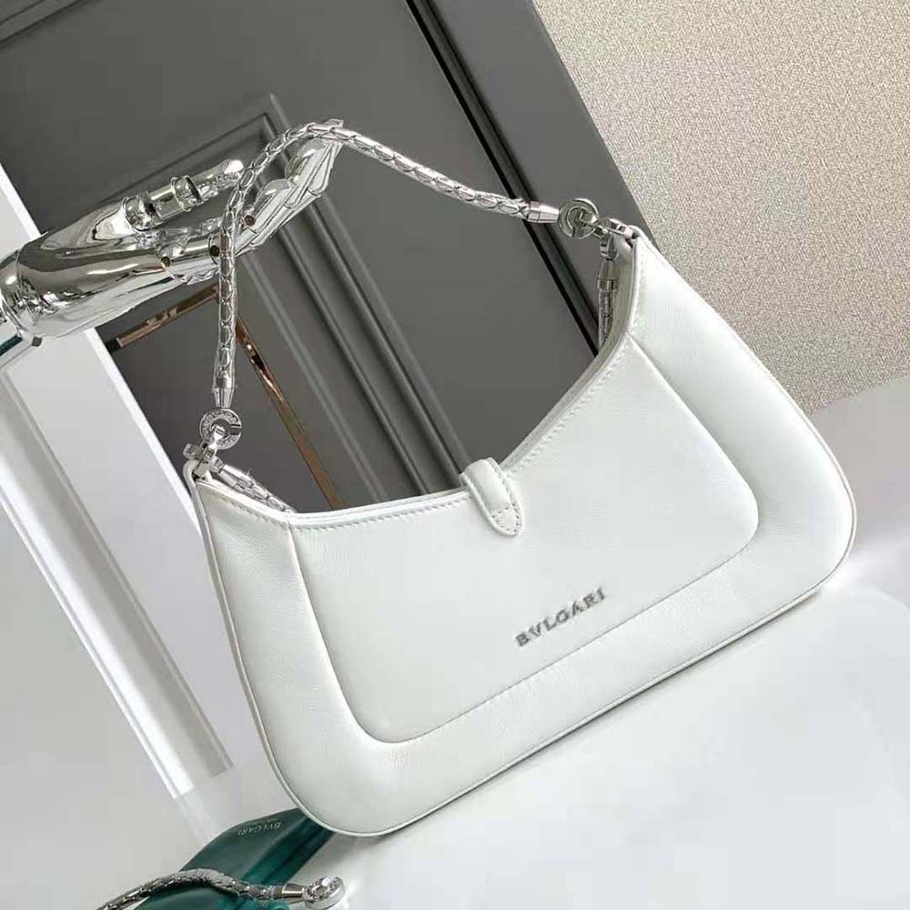 Side profile showing slim silhouette of Bvlgari Serpenti Baia Small Shoulder Bag white