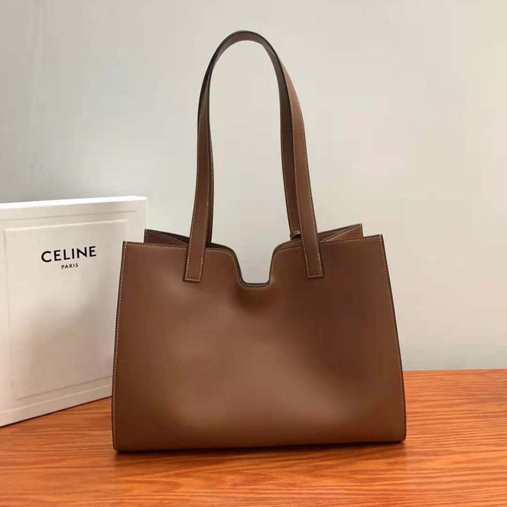 Side angle showing structured silhouette of Celine Women Cabas 16 Shoulder Bag