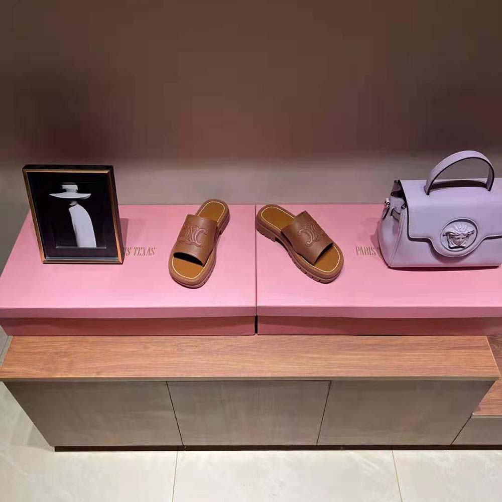 Top-down shot showing leather-lined footbed of Celine Women Clea Triomphe Slide