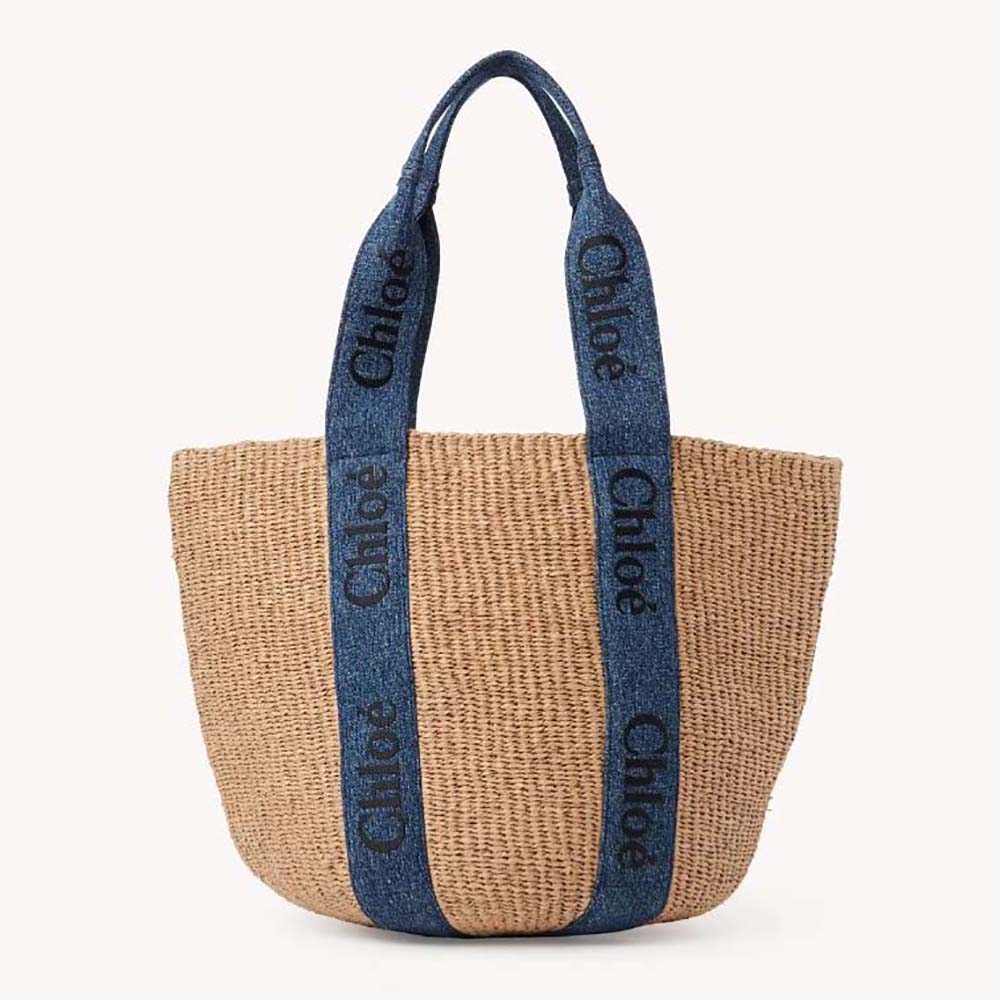 Front view of Chloe Women Large Woody Basket-Navy with drawstring closed