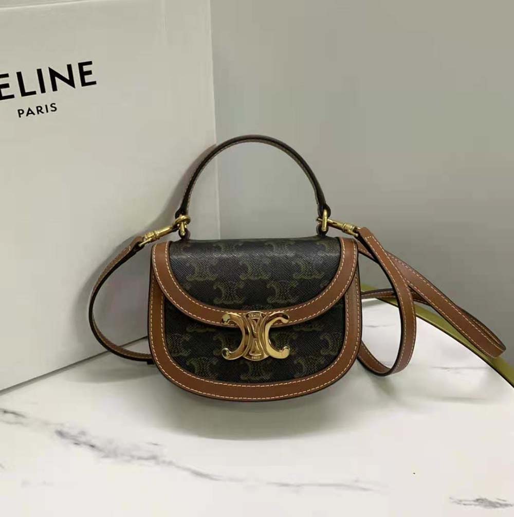 Close-up of gold Triomphe clasp on Celine Women Mini Besace Triomphe