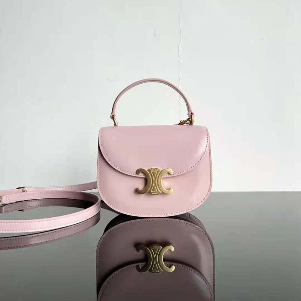 Close-up of gold Triomphe clasp on Celine Women Mini Besace Triomphe
